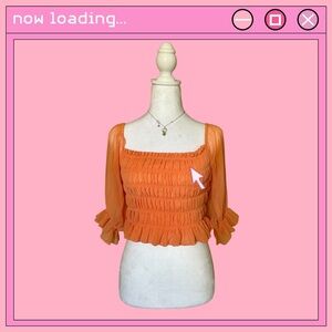 Urban Outfitters coral ruffled top